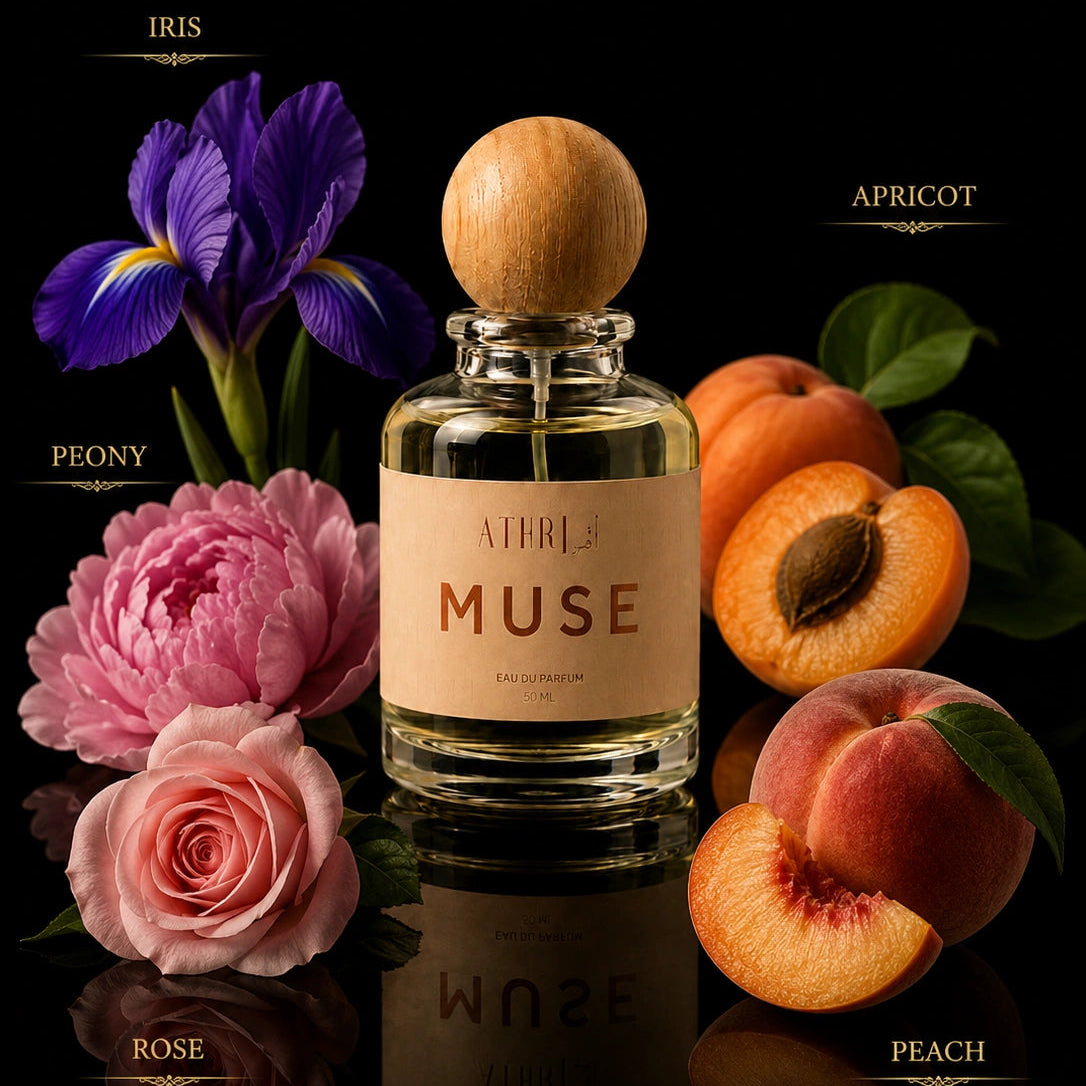 A perfume bottle labeled AETHER MUSE with a wooden cap, surrounded by flowers and fruit on a black reflective background. Text labels identify the scents: IRIS, PEONY, APRICOT, ROSE, and PEACH.