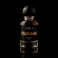 A 50 ml bottle of Athiri Tsunami Eau de Parfum with a black label and a dark wooden cap, set against a solid black background with a subtle reflection below.