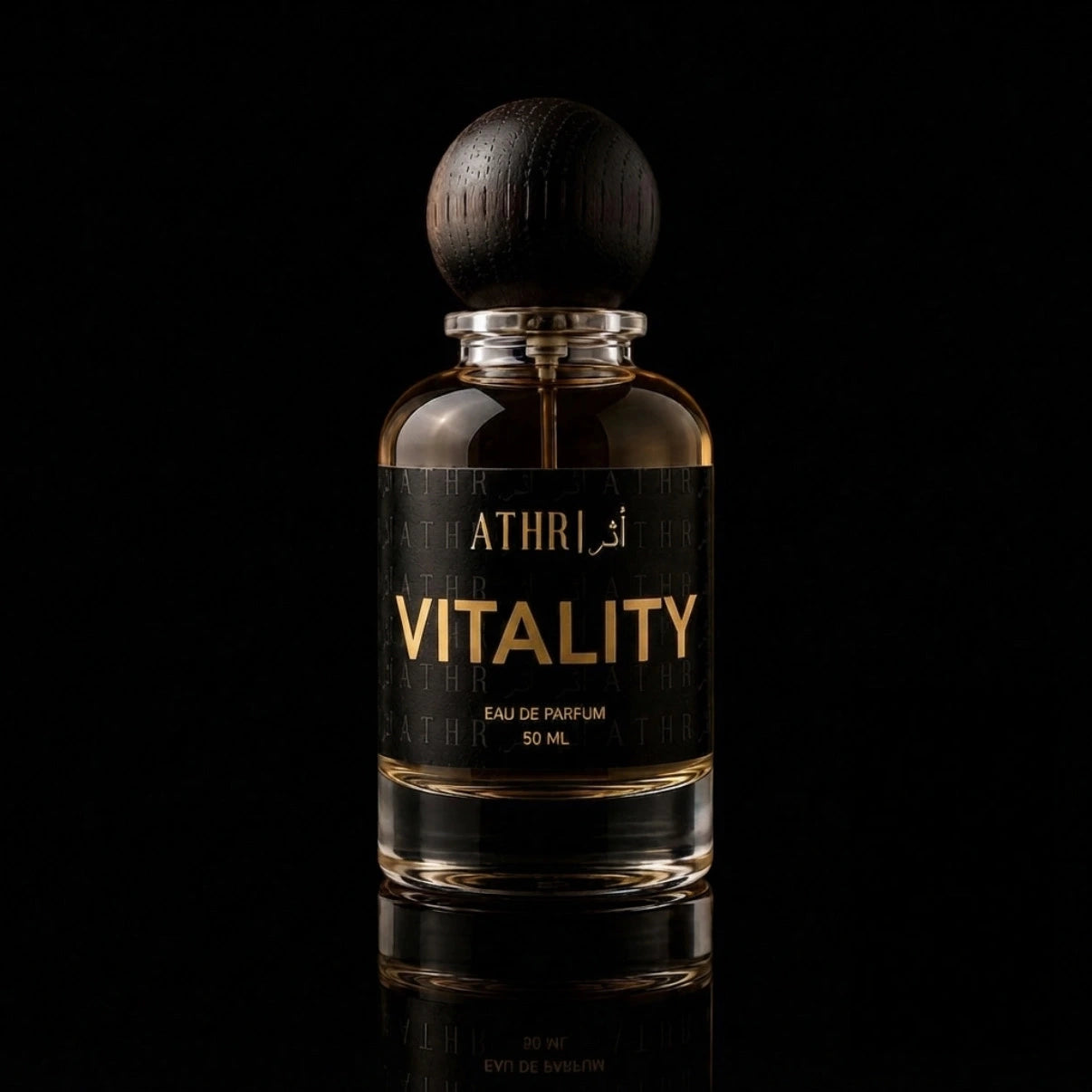 A 50 ml bottle of Athri Vitality Eau de Parfum with a dark wood-grain spherical cap, set against a solid black background with a subtle reflection below.