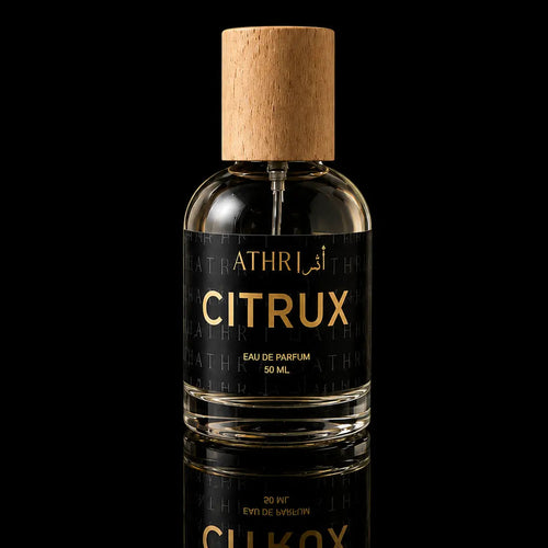 Perfume bottle labeled 'CITRUX' by Athri on a black background