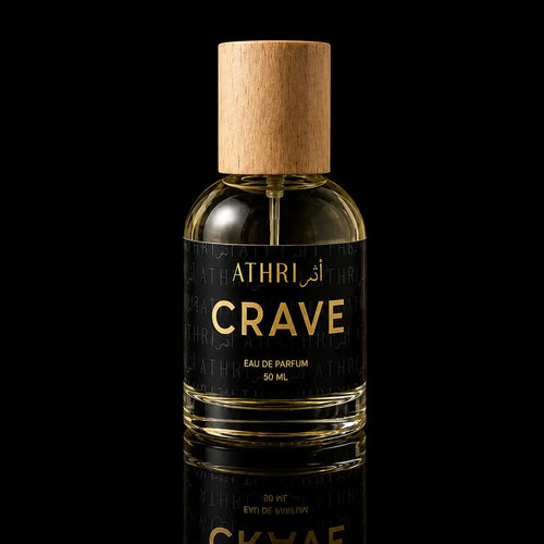 Athri Crave perfume bottle with wooden cap on a black background
