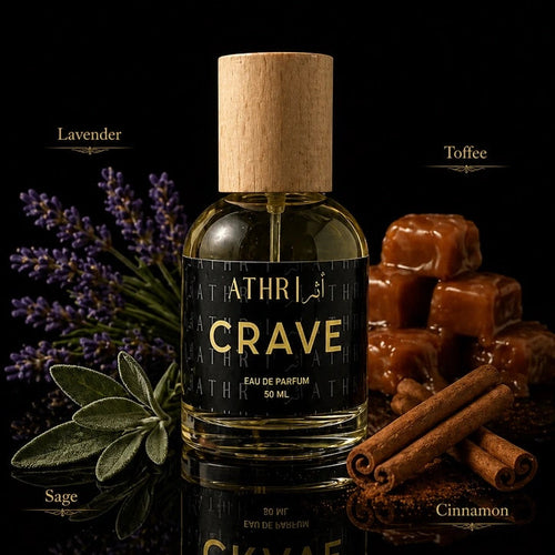 Athr Crave perfume bottle with lavender, cinnamon, and toffee on a dark background
