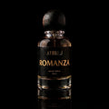 A 50 ml bottle of Athiri Romanza Eau de Parfum, featuring a dark amber liquid in a clear glass bottle with a black label and a dark wooden cap, set against a solid black background with a subtle reflection below.