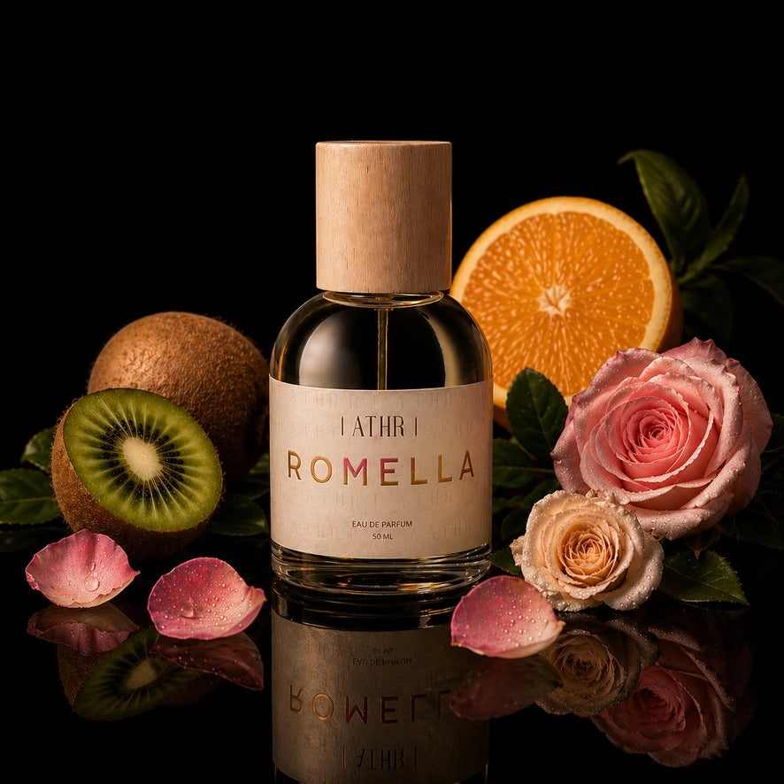 one perfume bottles, one labeled 'Romella' on black stands against a dark background.
